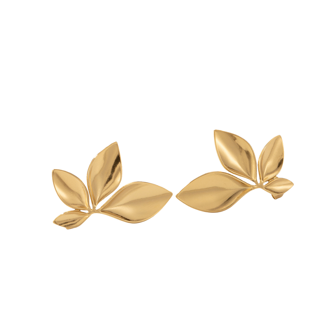 A Pair of gold leaf-shaped earrings on a white background